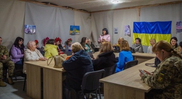 Ukrainian Families Enduring Years of War by Caroline Grube  