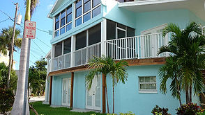 Completed residential stucco installation and exterior painting in Indian Rocks Beach, FL