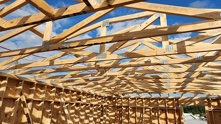 Second-story room addition framing and roof trusses in Seminole, FL