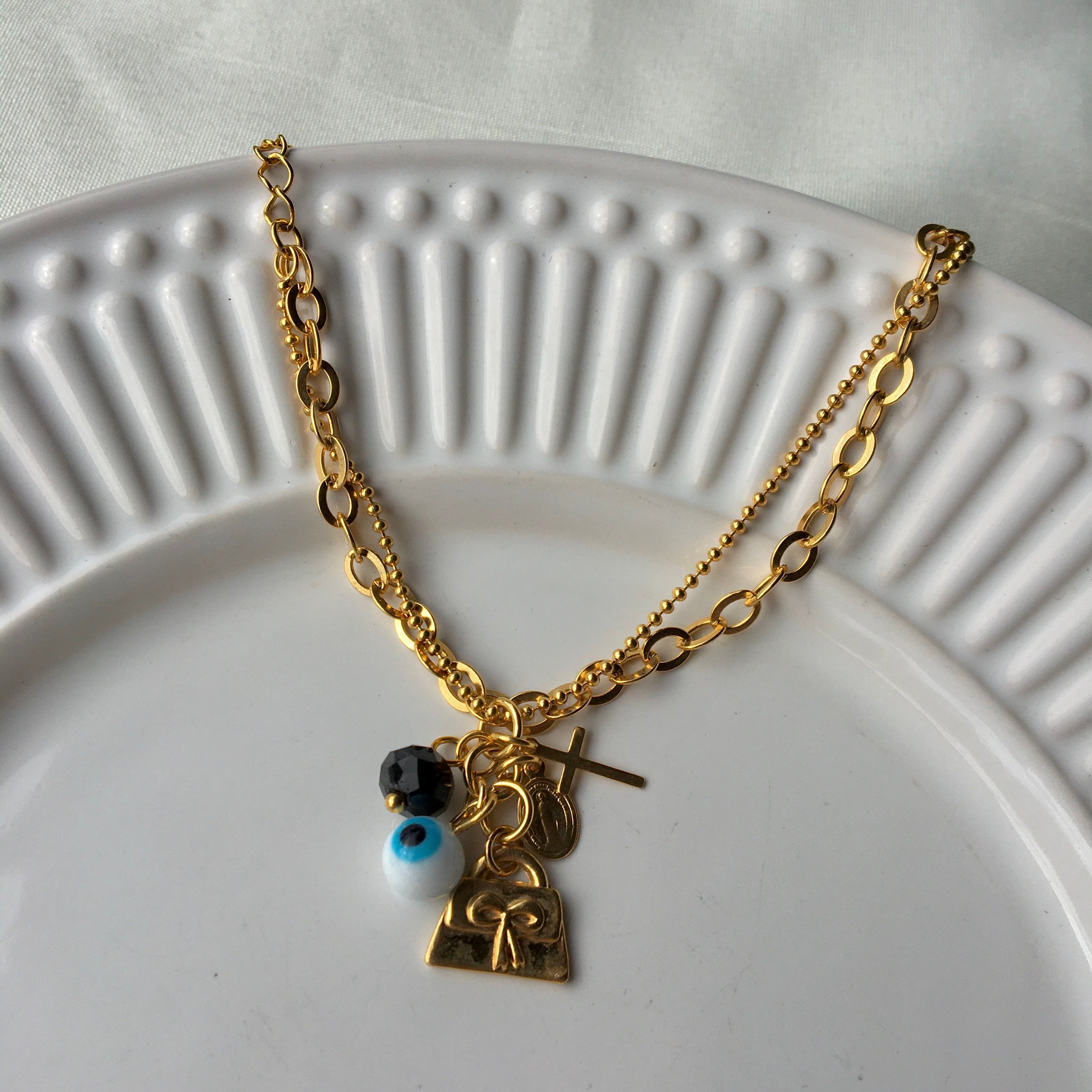 Pulseira 1 Olho Grego/ Bolsa/ Cristal Negro