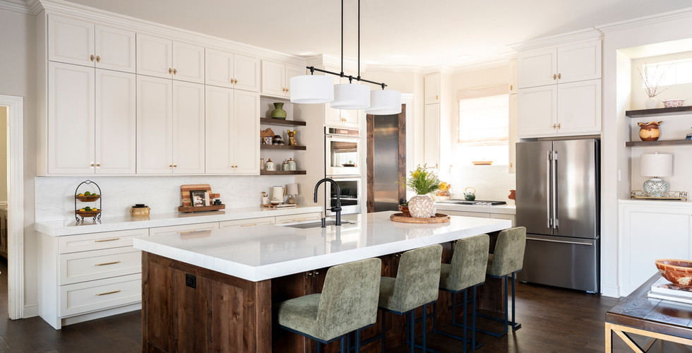 Luxury custom walnut kitchen island with white quartz counters by Zion Home and Building home remodeler dallas fort worth.