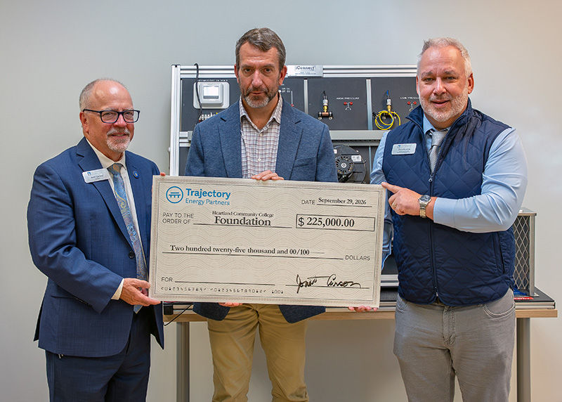 Heartland Community College President Keith Cornille, Trajectory Energy Partners Founder Jon Carson, Heartland Community College Vice President of Development and Community Engagement Chris Downing.