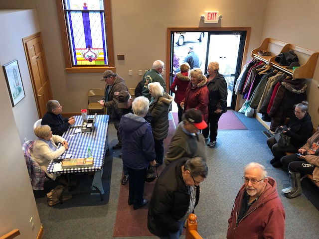 Visitors wait at the McDowell Methodist Church pancake and sausage stuffer Thursday / EOCI photo.