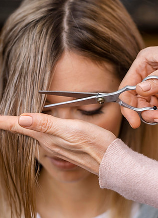 front-view-woman-getting-haircut.jpg