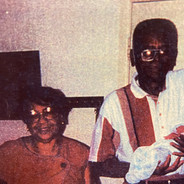 Roscoe is holding his third granchild, Ashley Godbolt, born August 1993 in Hattiesburg, MS. She was coming home from the hospital.