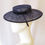 Thumbnail: Navy blue boater hat by Catherine Storm left view 2