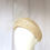 Thumbnail: Natural Beige Sinamay Headband Headpiece by Catherine Storm Millinery left view