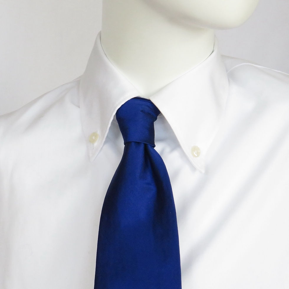 Thumbnail: Blue Deep dark purple silk dupion tie styled with a white shirt by Catherine Storm.