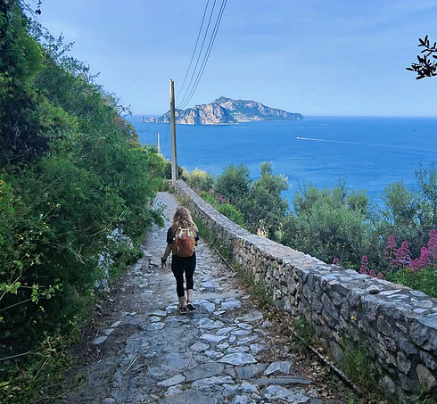 Emily walking along the Punta Campanella Trail