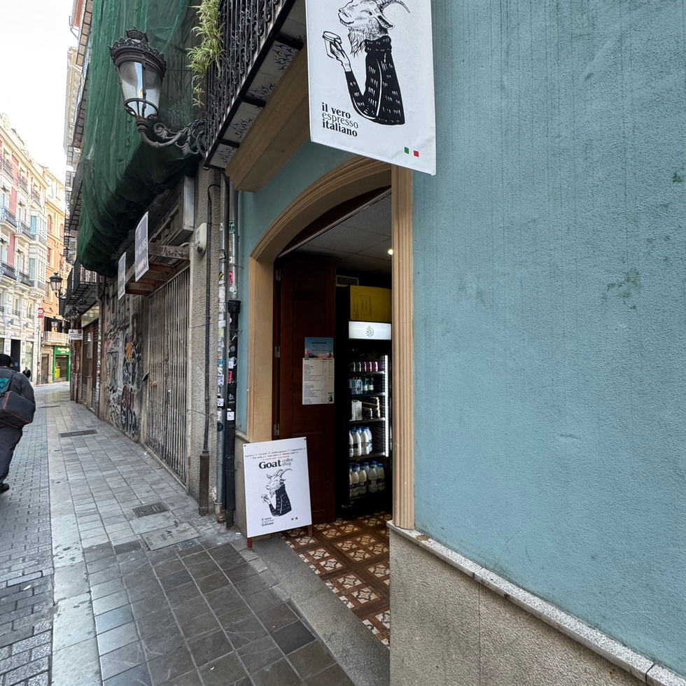 A front of a coffee shop called the goat