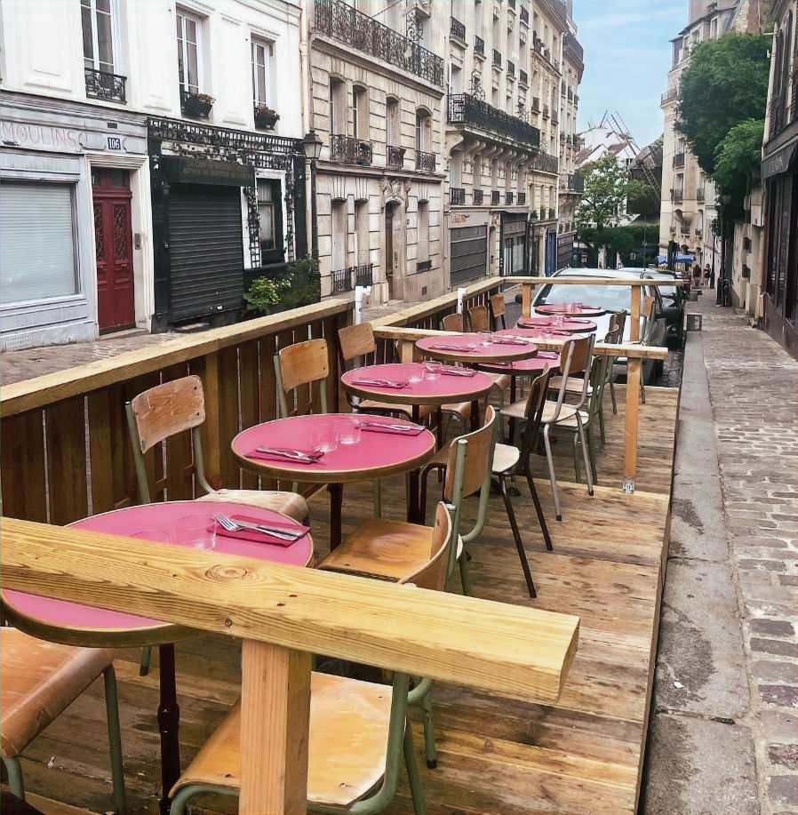 Dining tables, street-side, before opening