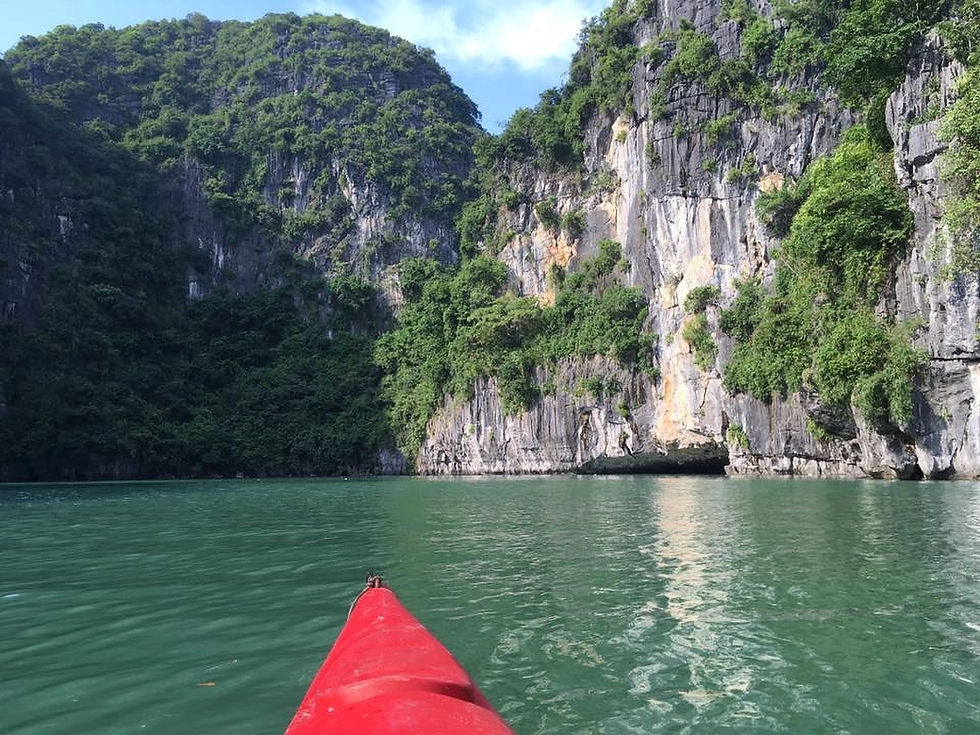 Kayaking through Ha Long Bay