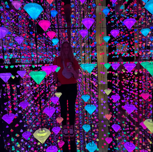 An art installation with lit up diamond shapes