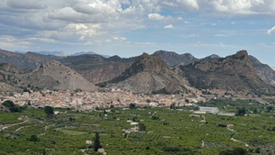 A mountainous region with a valley and small town