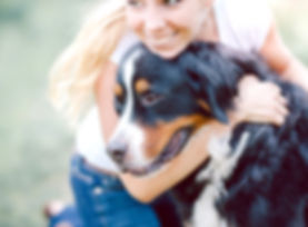 Woman Hugging Dog