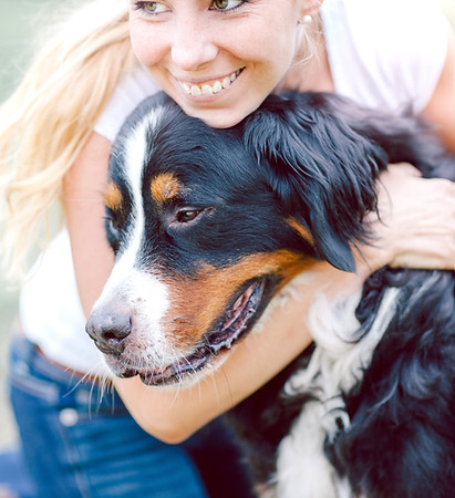 Woman Hugging Dog