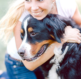 Woman Hugging Dog