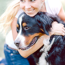 Woman Hugging Dog