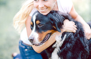 Woman Hugging Dog