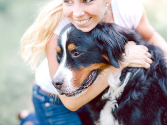 Woman Hugging Dog