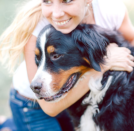 Woman Hugging Dog