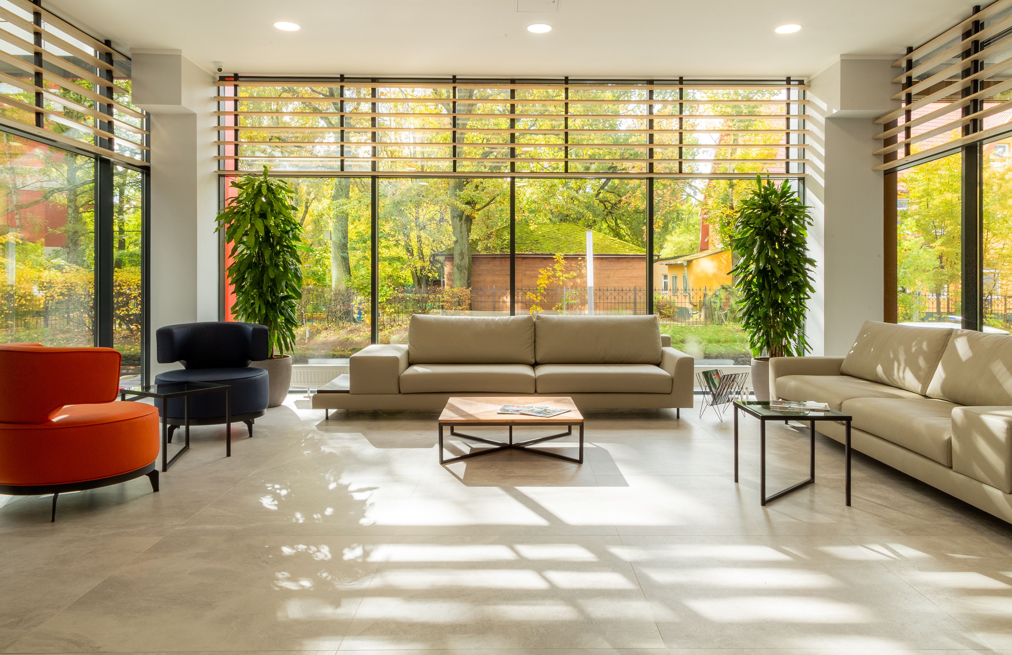 Bright modern living room with floor-to-ceiling windows