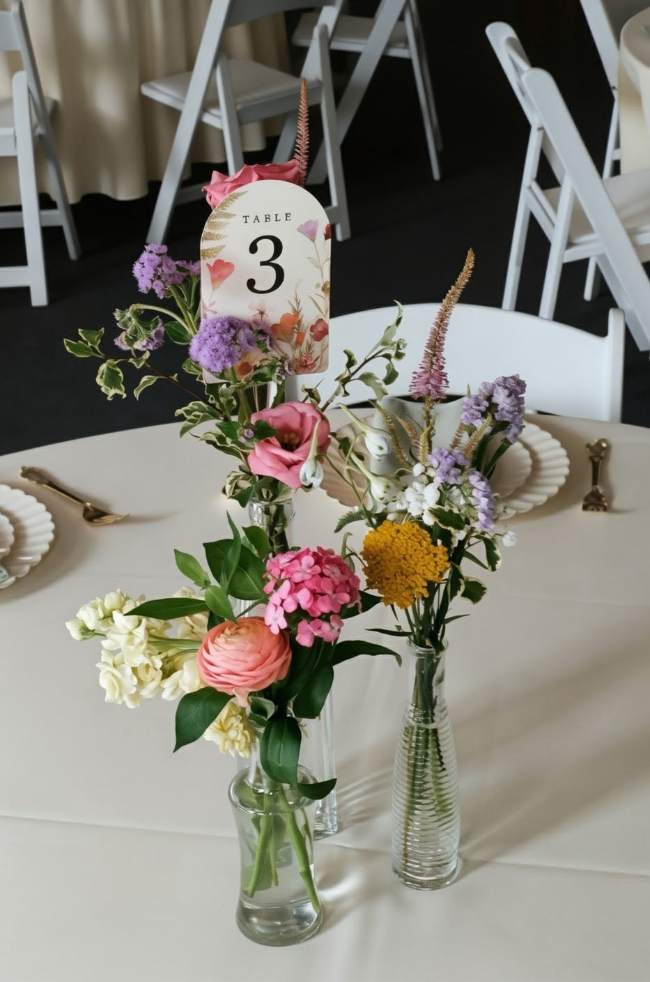Simple wedding flower centerpiece with some local flowers