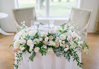 Sweetheart table flower arrangement