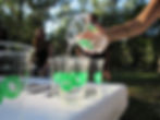 Pouring water into an Earth Cup