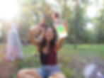 Girl holding a cup