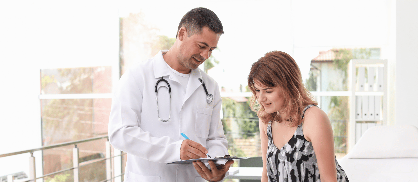 Doctor reviewing a medical weight loss plan with a patient in Miami Lakes