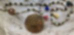 chapelet fleur de vie fond bois.jpg