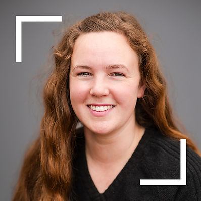 Michaleah Robinson, Equine Specialist smiling in black shirt