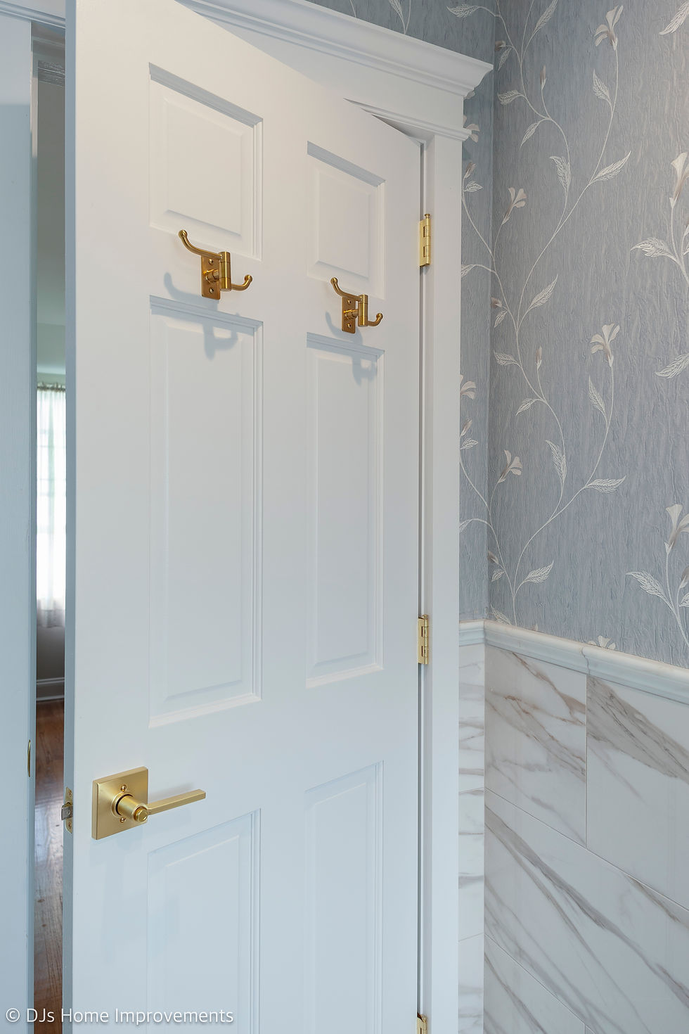 Kohler Castia™ robe hooks.