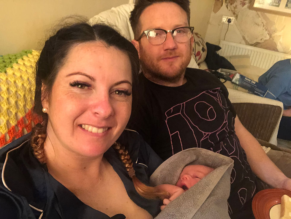 Georgie Blackman and husband with their first baby