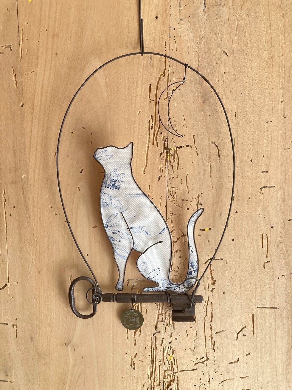 Miniature : Chat perché sur clef