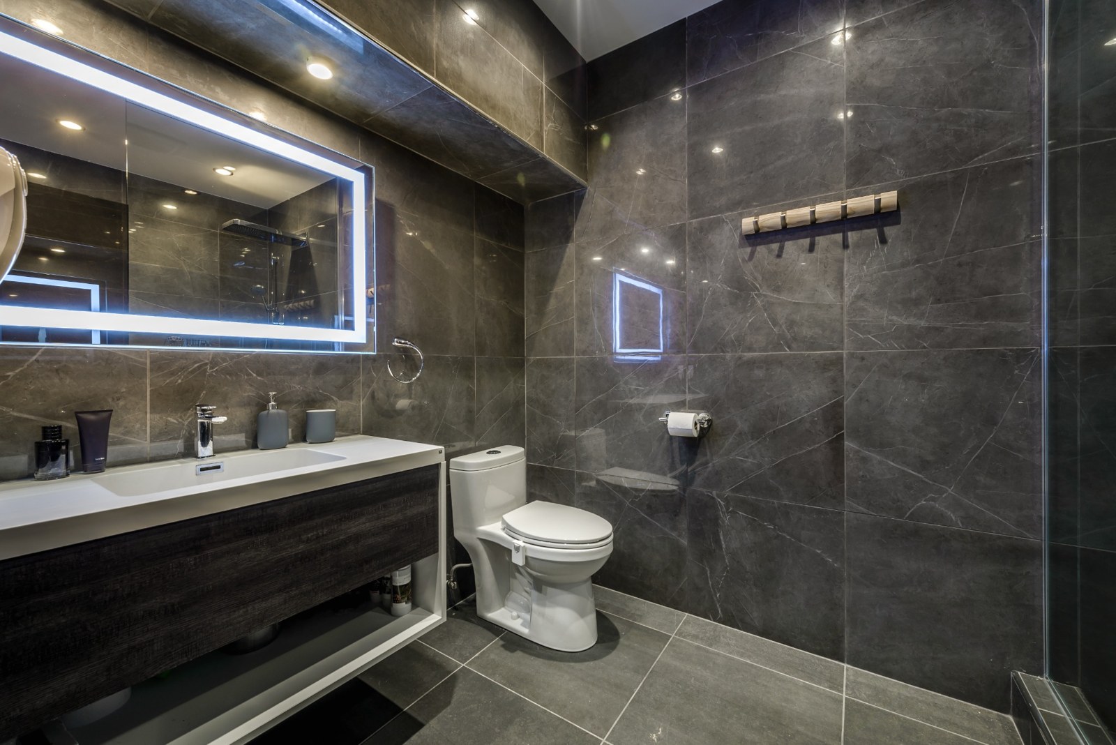 Dark bathroom with visible tile joints