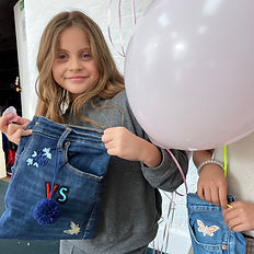 A young girl showing her creativity at the chillie kids club