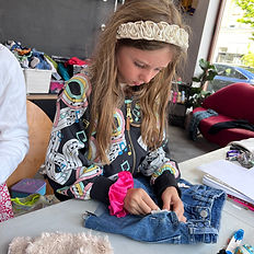 A kid focusing during an after school workshop at The Chillie Kids Club.