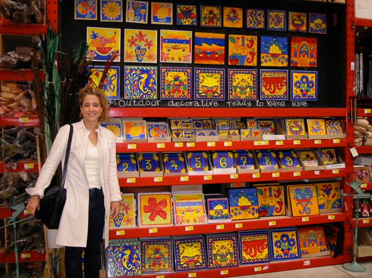 Justine Playford in front of Bunnings bay full of Lemon Zebra Tiles