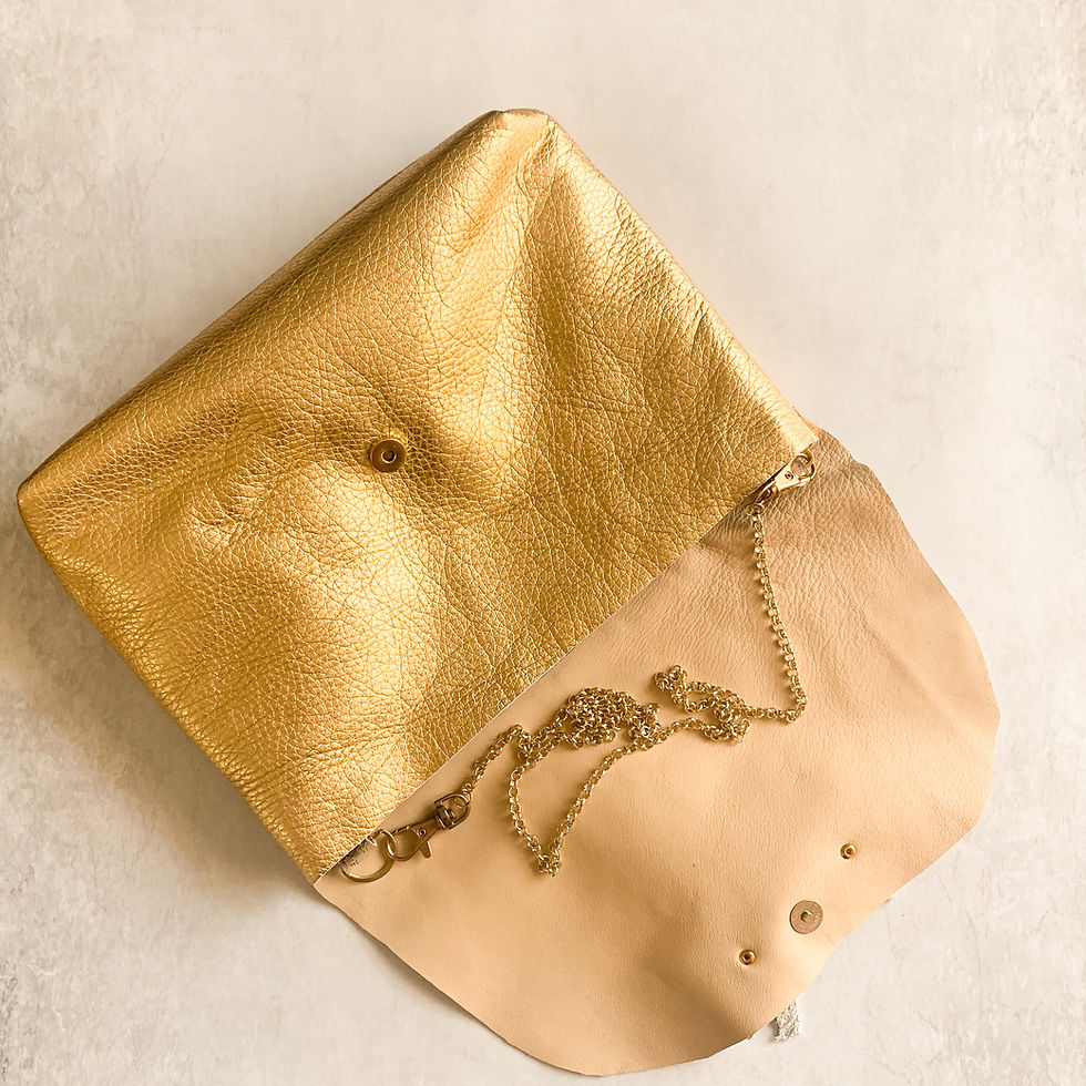 Thumbnail: Bright gold and embossed leather clutch