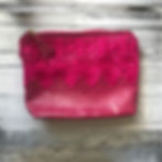 pink zipper clutch