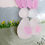 Thumbnail: A close up of a wooden hanging decoration, hand painted and decorated with sea glass to depict an Easter Bunny