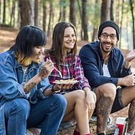 Friends Camping in Woods