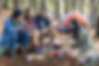 Friends Camping in Woods
