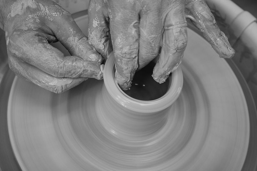 Working the wheel at The Pottery in Toronto
