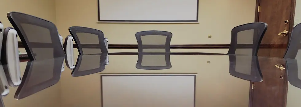 Conference room chairs and whiteboard