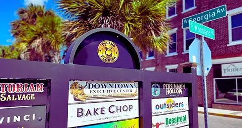 Downtown DeLand directory sign: Bake Chop, Outsiders, Downtown Executive Center