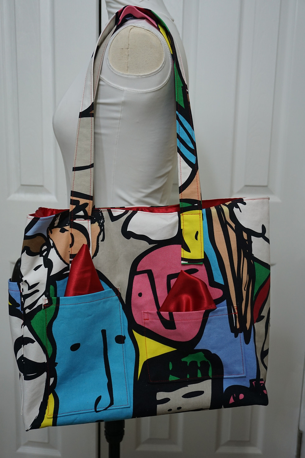 Large tote with front pockets on mannequin