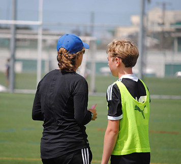 Coach JT with Wyatt.jpeg